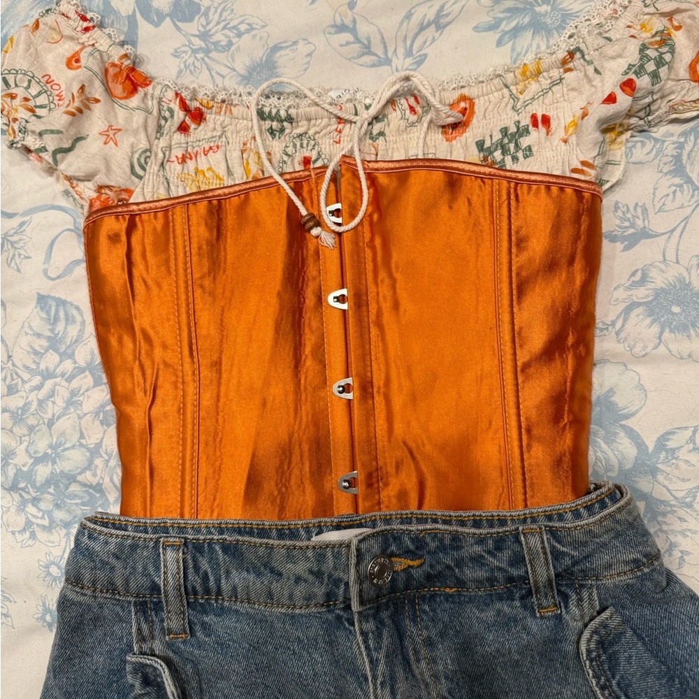 Amazon Orange Satin Blouse with Floral Accents